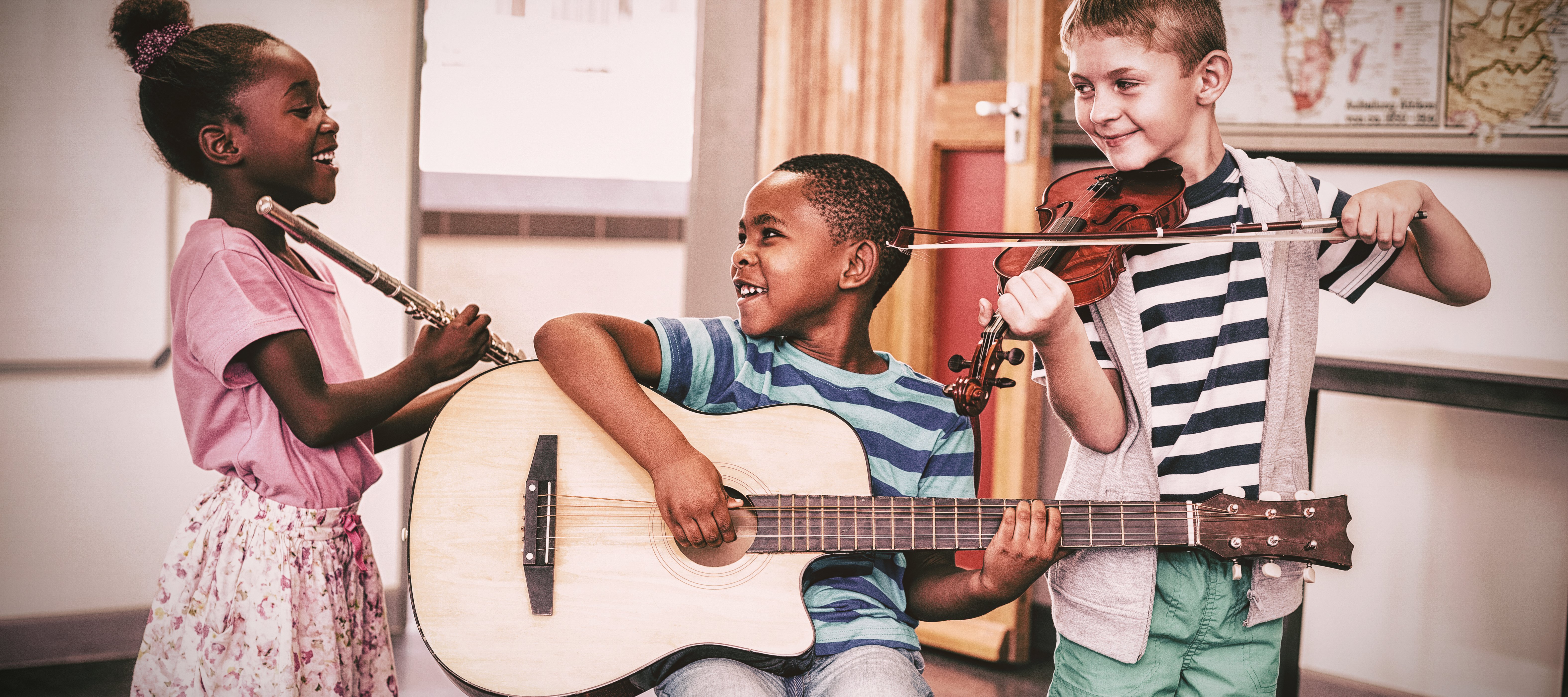 Child playing guitar.