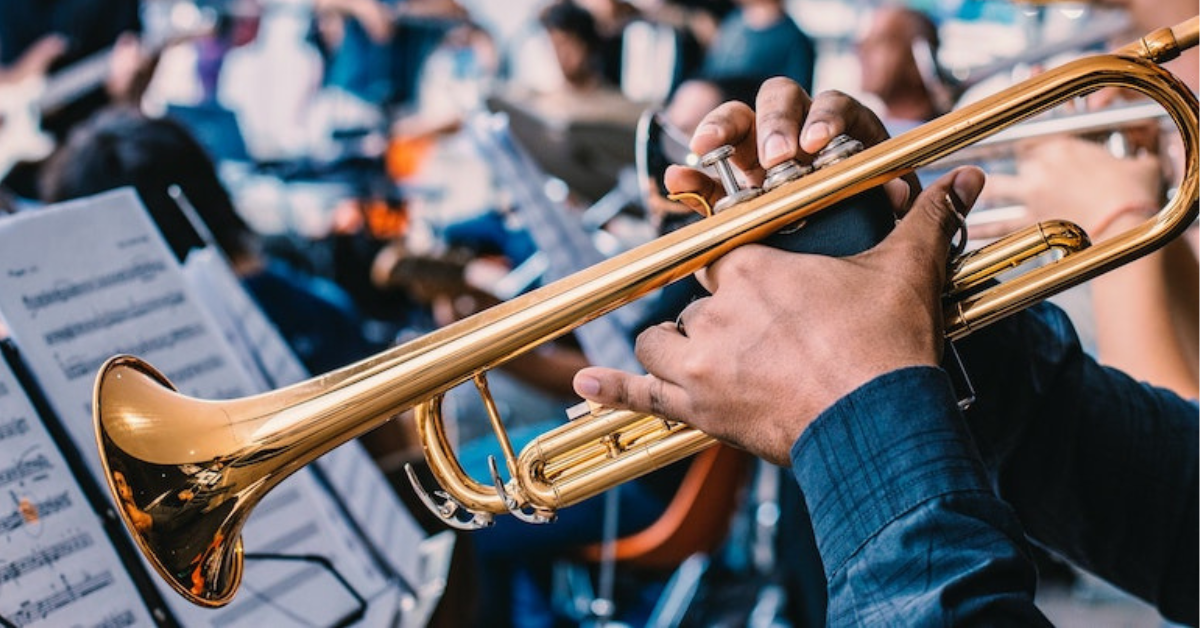Children playing trumpet in a band.