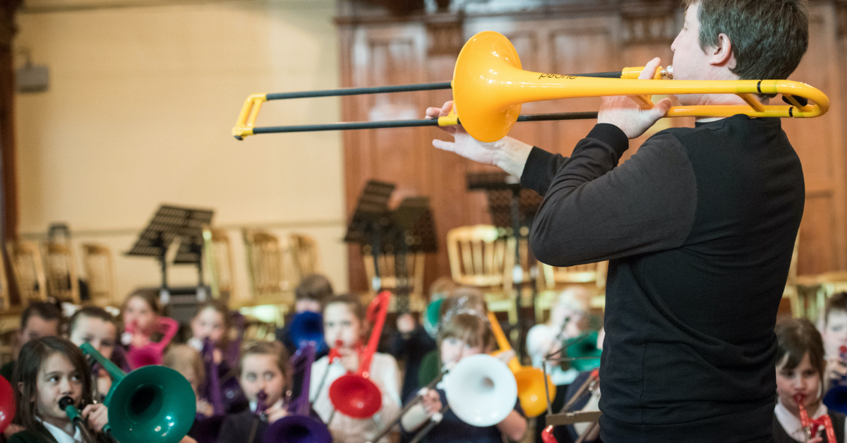 A class playing their pBones.