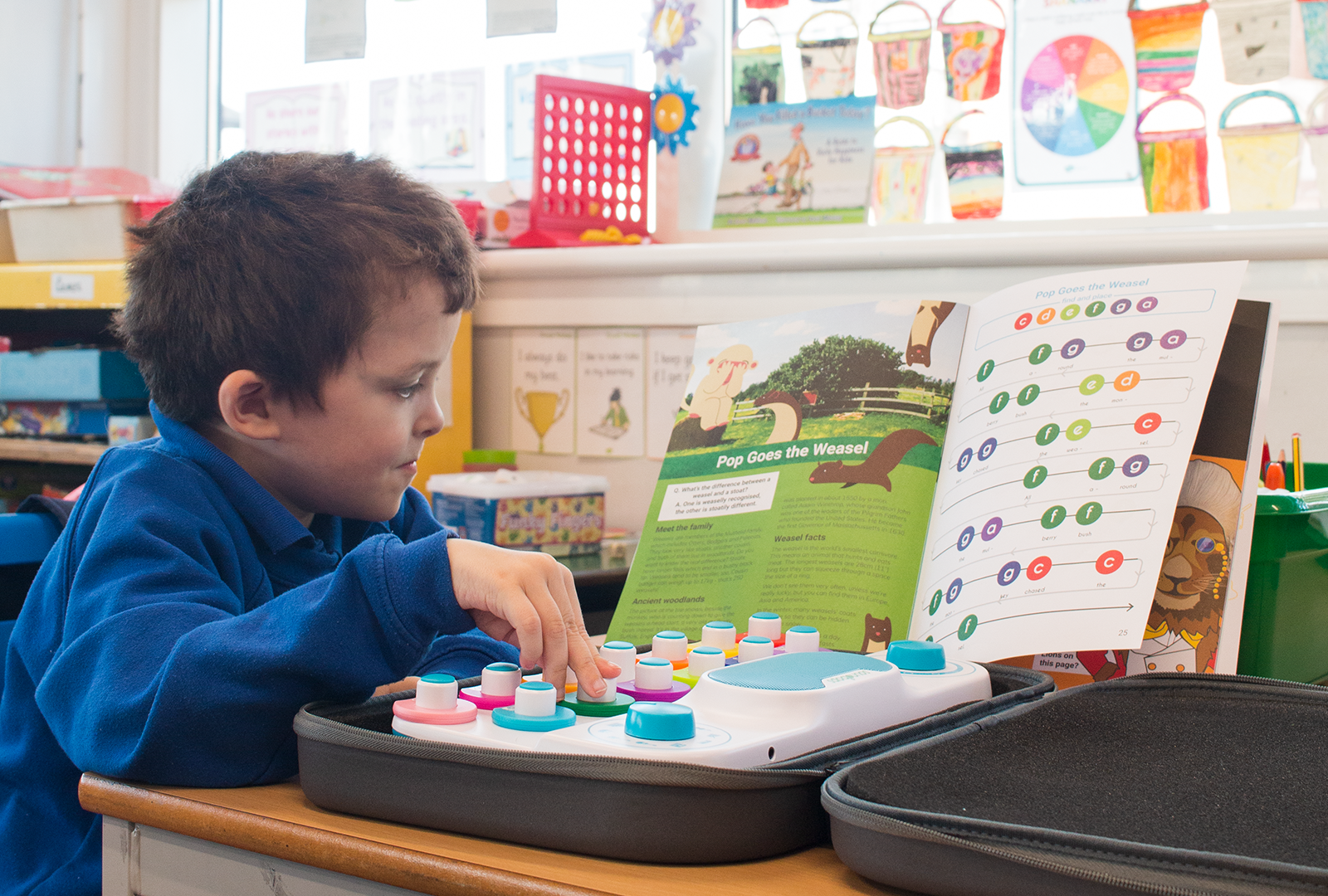A child learning to play music with Soundbops.