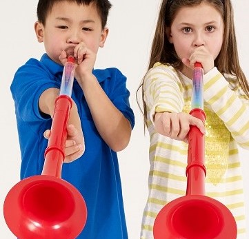Two children playing pBuzz.