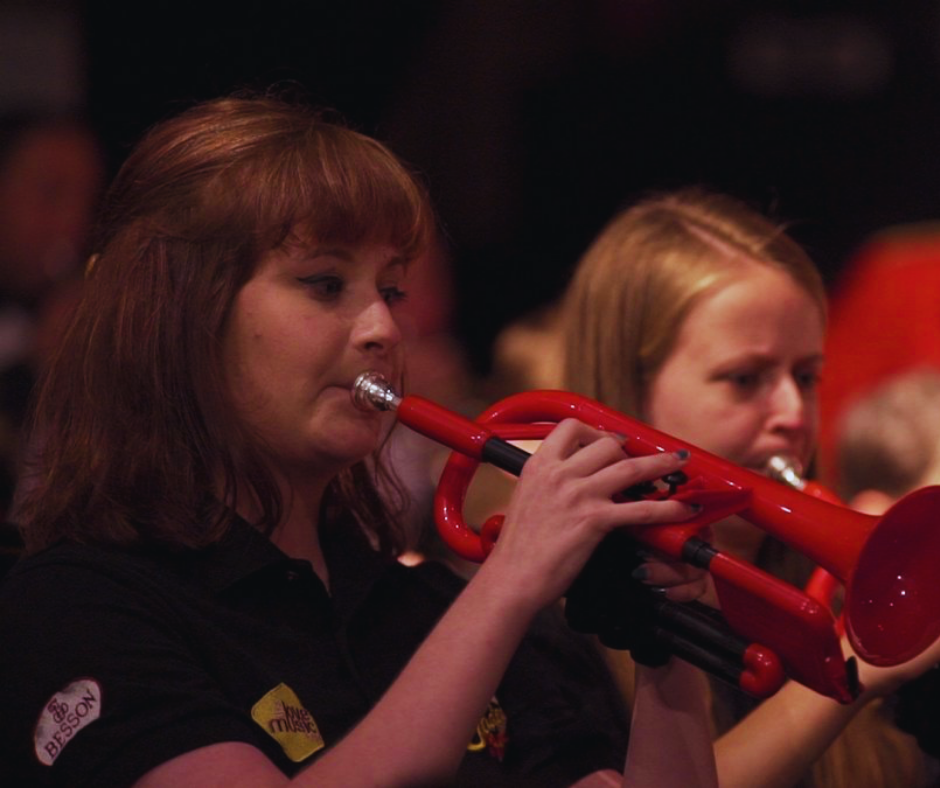 two children playing pTrumpet